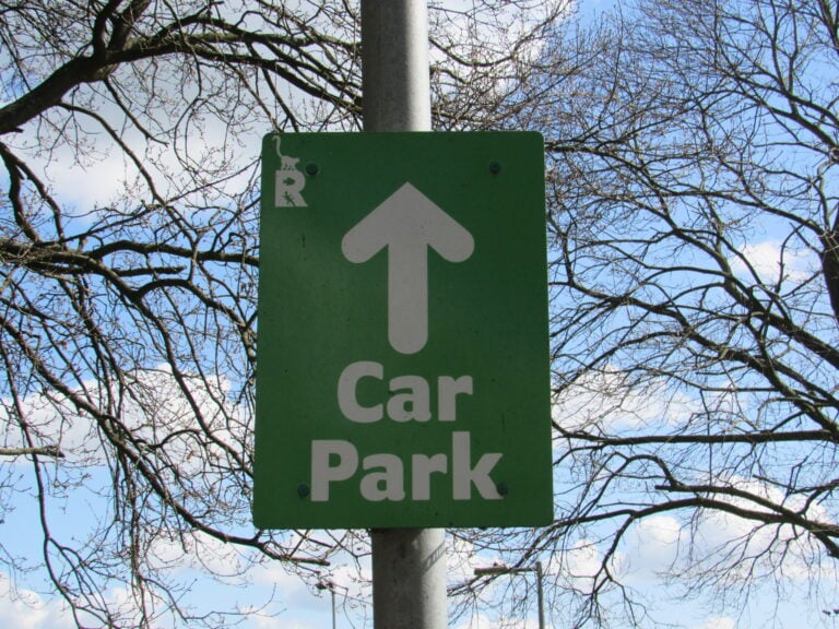Car park sign hung on a post